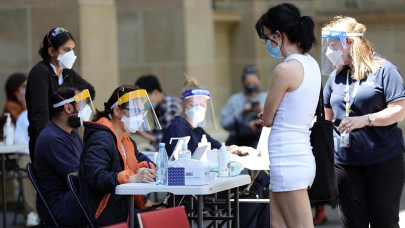 Victoria will recruit 1000 vaccinators as the state reports 40,127 COVID-19 cases and 21 deaths.