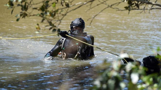 Police divers have joined the search for a swimmer who went missing in a river on Friday. (Dan Peled/AAP PHOTOS)