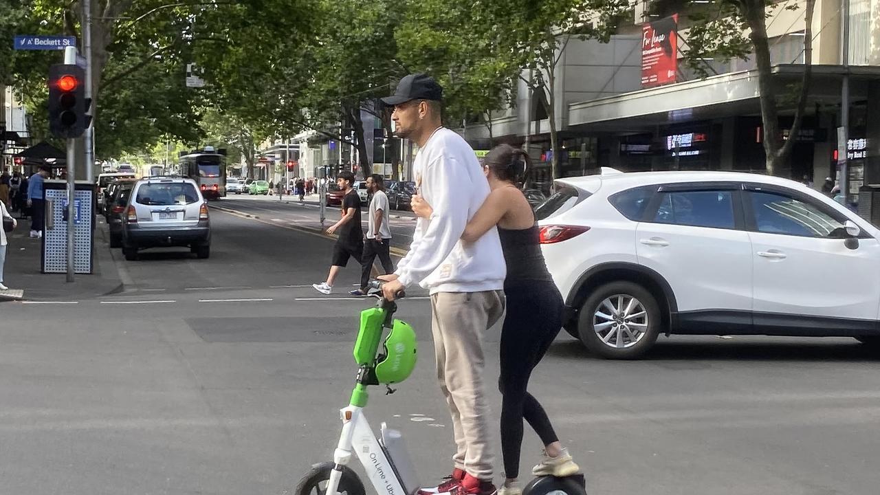 Australian tennis player Nick Kyrgios riding a e-scooter on Elizabeth street in Melbourne, Sunday, January 15, 2023. (AAP Image/James Ross)