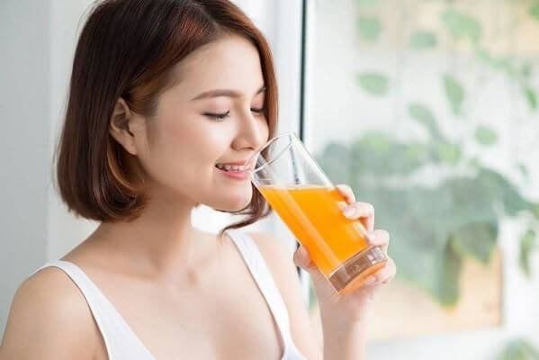 Uống nước cam hằng ngày có đẹp da? Những lợi ích bất ngờ và tác dụng phụ đáng chú ý của nước cam - 4