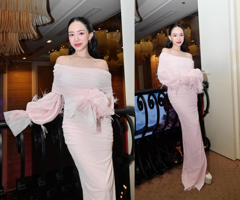 Xuất hiện tại đám cưới bạn thân mới đây, Joyce Phạm diện 1 thiết kế đầm ôm màu hồng pastel xinh xắn. Tuy nhiên, cô nàng lại tạo dáng rất khéo khi dùng tay che bụng.