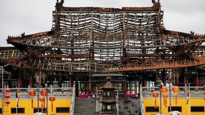 It took 80 firefighters to put out the fire that damaged a Buddhist temple in Melbourne's southeast. (Diego Fedele/AAP PHOTOS)