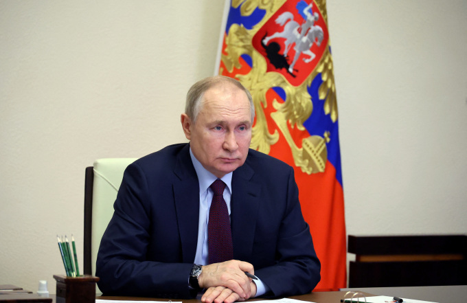Tổng thống Nga Vladimir Putin chủ trì cuộc họp với các thành viên chính phủ ngày 11/1. Ảnh: Reuters