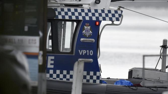 A water police unit rescued the stricken sailors from their disabled yacht in Bass Strait about 3am. (Mal Fairclough/AAP PHOTOS)
