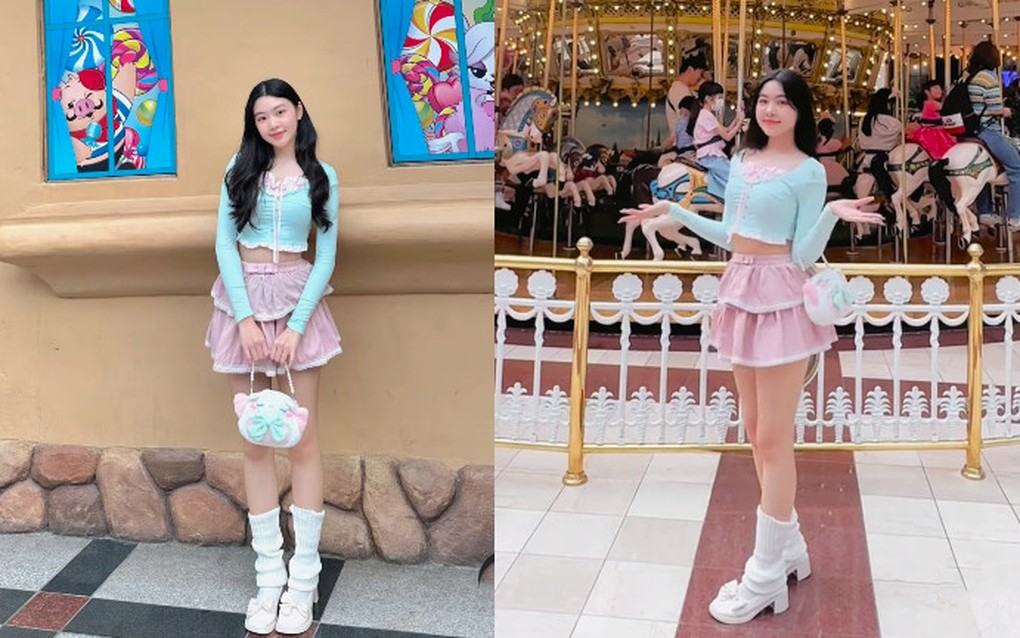 Trong kỳ nghỉ hè vừa qua, hai con gái MC Quyền Linh có cơ hội du lịch Hàn Quốc. Khi đến khu vui chơi nổi tiếng, Lọ Lem phối trang phục tông màu tươi sáng, phù hợp với không gian. Nhờ chiều cao 1,70m, cô dễ dàng cân được mẫu váy bèo nhún xếp tầng.