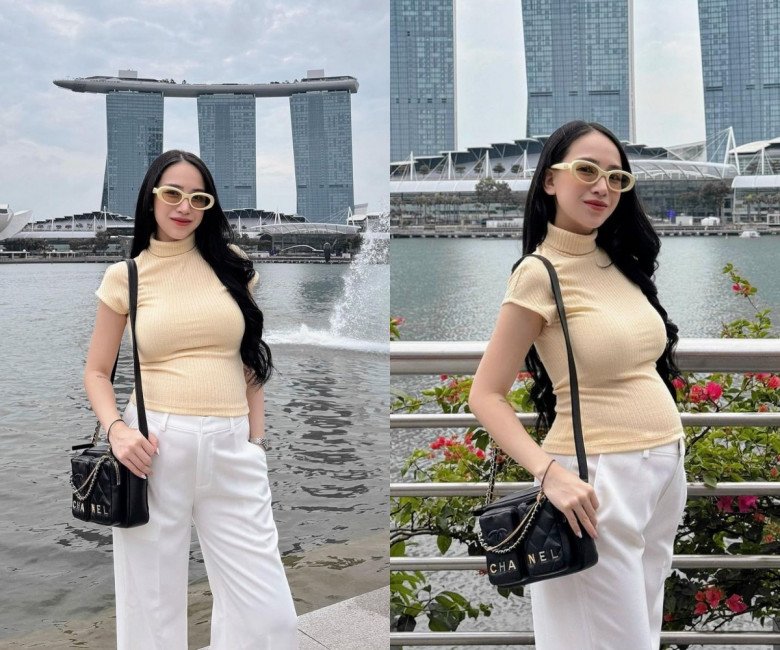 Joyce Phạm vừa mới đăng tải lên trang instagram hình ảnh mới. Mẹ bầu diện thiết kế thời trang hơi hướng năng động và công sở là áo cộc tay cổ lọ mix cùng quần âu ống suông.