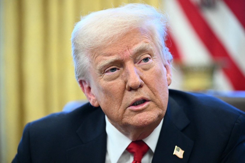 Tổng thống Donald Trump trả lời họp báo tại Nhà Trắng ngày 26/3. Ảnh: AFP
