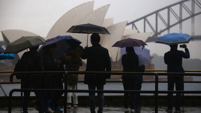 A predicted wet Easter for Sydney, Brisbane, Canberra and Melbourne is expected to curb travel plans (David Gray/AAP PHOTOS)