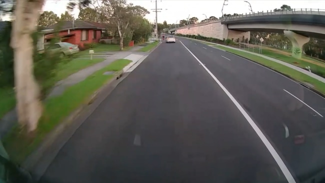 Footage showing white Lancer slowing down behind the cyclist. Picture: Victoria Police. 