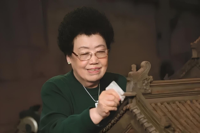 Bà Trần Lệ Hoa dành tâm huyết cuối đời cho Bảo tàng Cung điện đỏ. Ảnh: QQ