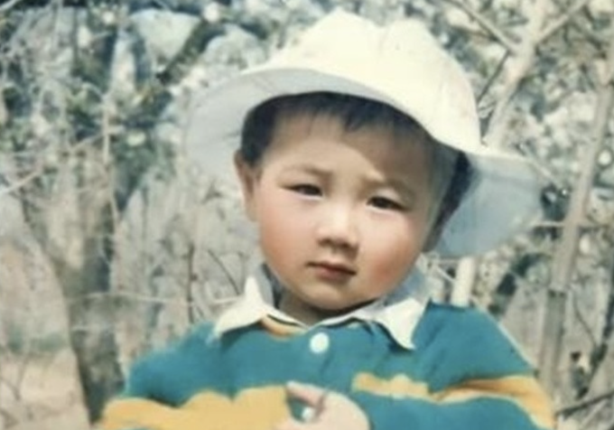 Ảnh chụp Wang Guanguan năm 4 tuổi, con trai ông Wang Chuanqiang, mất tích 33 năm trước. Ảnh: Sina