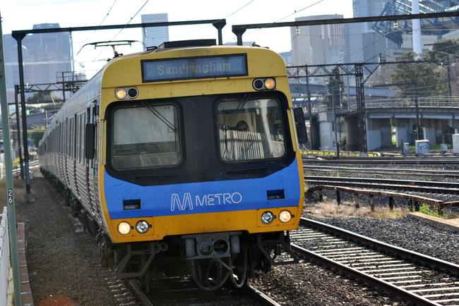 A Metro train approaches Richmond station in Melbourne.