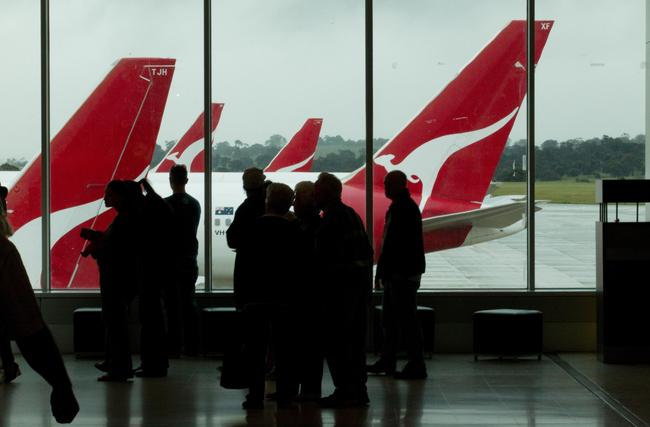 Qantas has cancelled more than a dozen services either in or out of Melbourne amid a spiralling COVID situation.