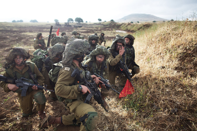 Binh sĩ tiểu đoàn Netzah Yehuda của Israel tham gia khóa huấn luyện ở Cao nguyên Golan năm 2014. Ảnh: AFP