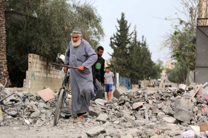 Cảnh hoang tàn ở Al-Zawayda, miền trung Dải Gaza, sau trận không kích của Israel ngày 11/5. Ảnh: AFP