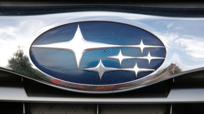 The front grill of a Subaru car.