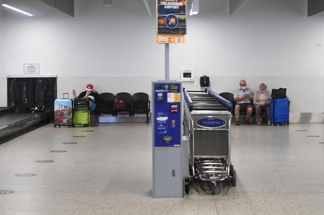 People travelling from Sydney ‘red zones’ without a valid exemption will be sent back. File image of Melbourne airport. 