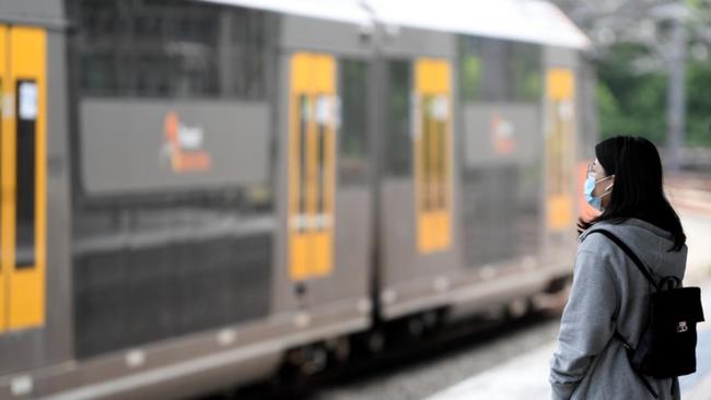 Commuter at a train station in Sydney.