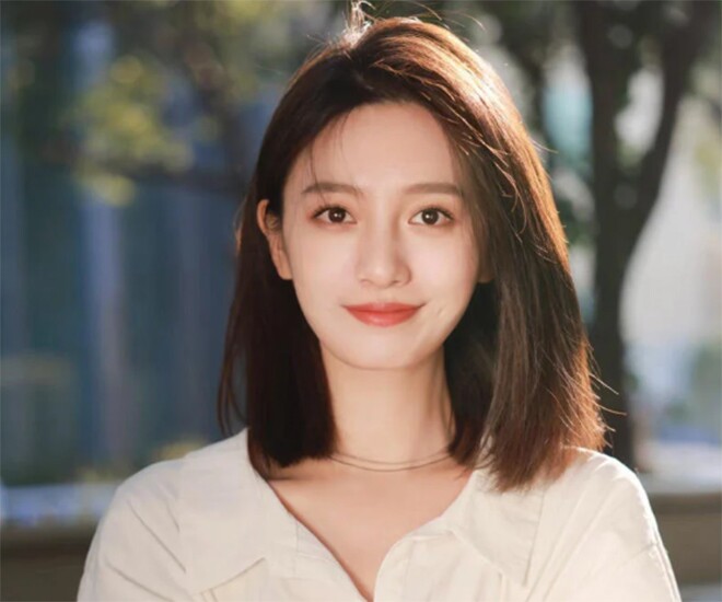 Tóc ngang với với độ dài tóc chấm đếm phần vai.