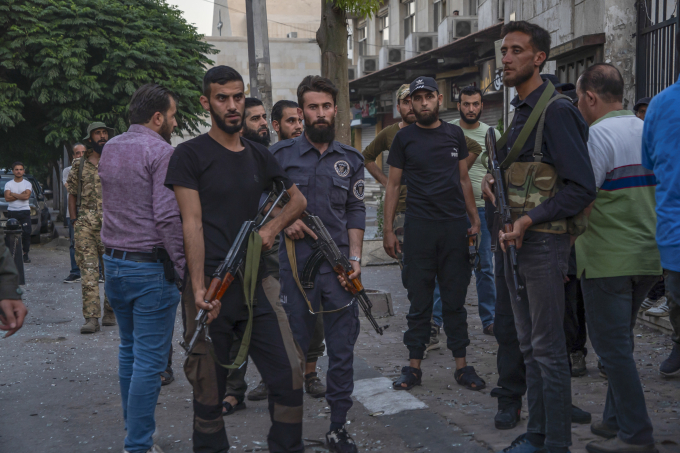 Lực lượng an ninh Syria được huy động đến hiện trường vụ đánh bom tự sát nhà thờ tại Damascus. Ảnh: AFP