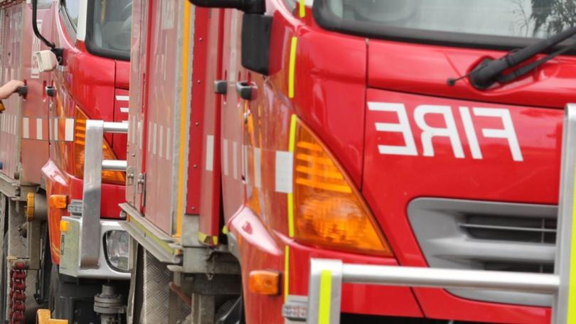 Authorities have established a crime scene after a house fire in Tallarook north of Melbourne.