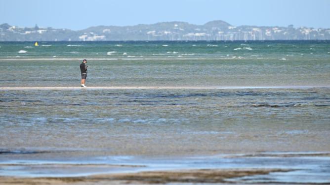 Two women were rescued after getting into trouble while paddle boarding in Port Phillip Bay. (James Ross/AAP PHOTOS)