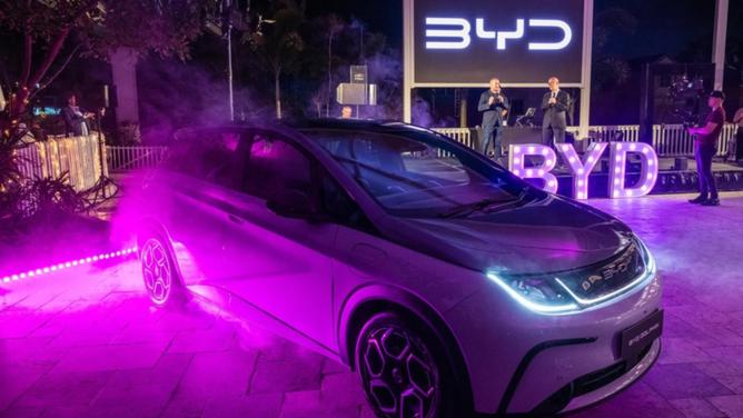 EV Direct chief executive Luke Todd launches the BYD Dolphin electric car on the Gold Coast. (Jennifer Dudley-Nicholson/AAP PHOTOS)