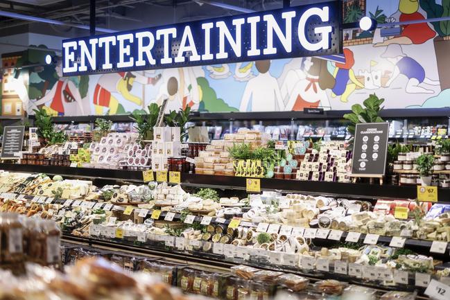 The store features a 48ft (14m) long cheese case with more than 130 cheeses.