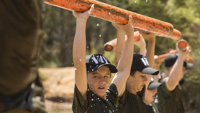 Drills such as logs held overhead help instil dicipline.