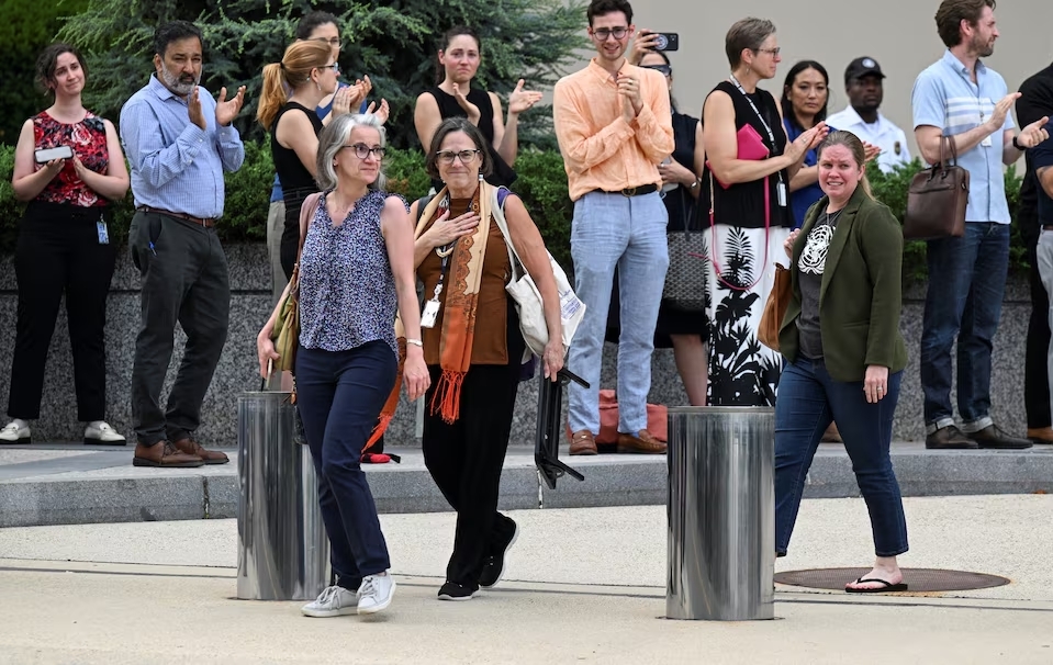 Các nhân viên Bộ Ngoại giao Mỹ trong buổi lễ chia tay tại Washington ngày 11/7. Ảnh: Reuters
