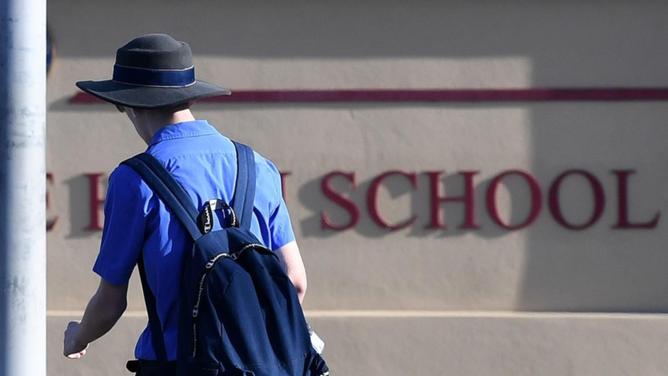 A report says public schools need billions of dollars more for students to reach minimum standards. (Dan Peled/AAP PHOTOS)