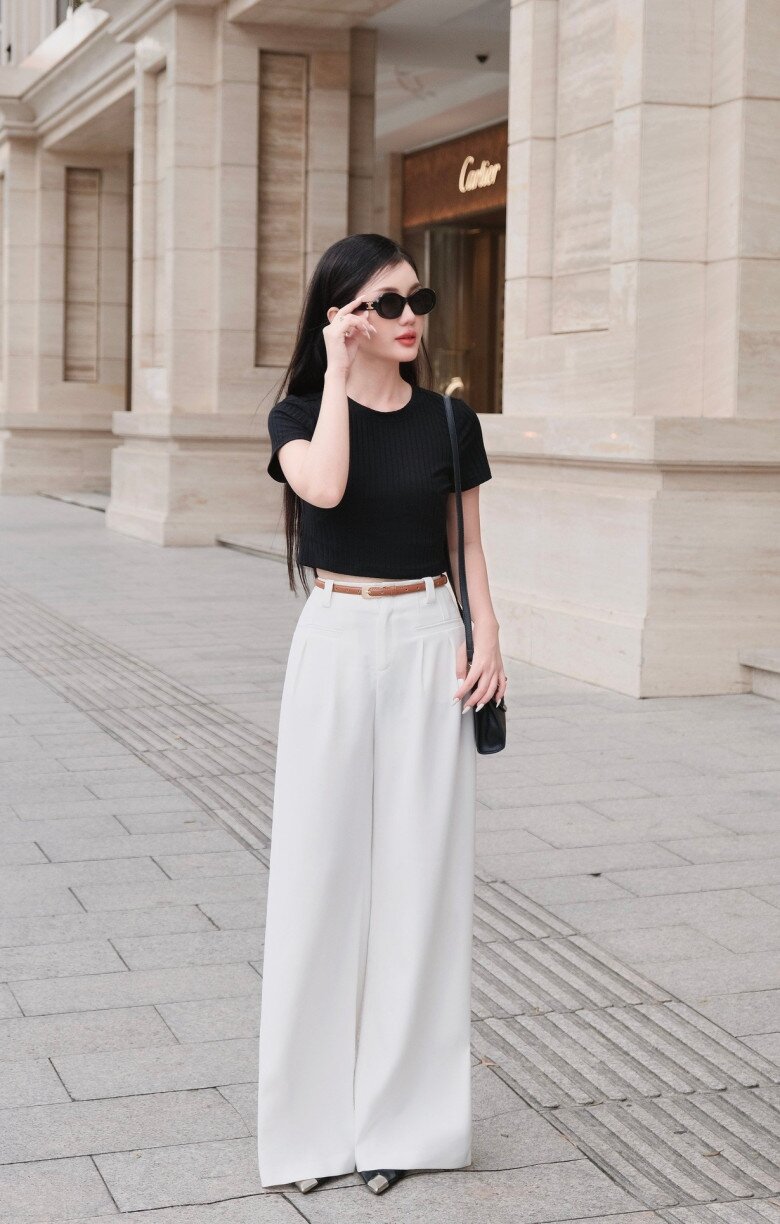 Thắt lưng không chỉ là điểm nhấn mà còn giúp tạo vòng eo, phân chia tỷ lệ vóc dáng hài hòa và tôn dáng.