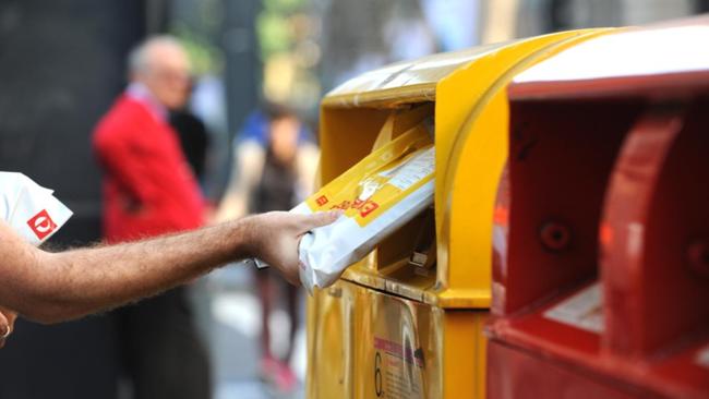 A file image of a person posting mail