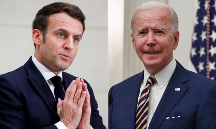 Tổng thống Pháp Emmanuel Macron (trái) và Tổng thống Mỹ Joe Biden. Ảnh: AFP.