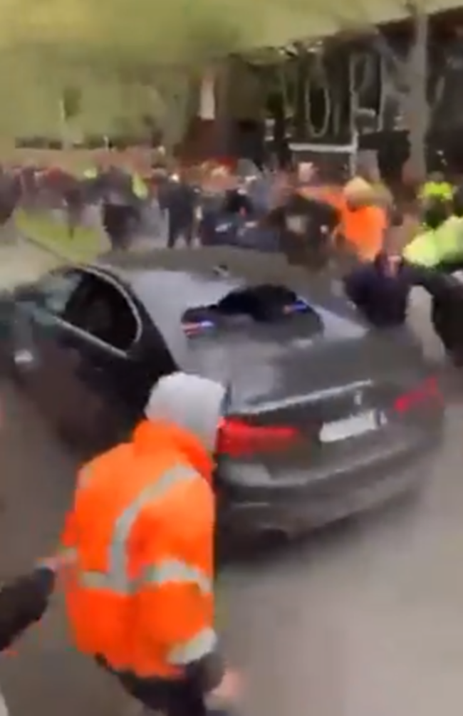 One police car was seen with a smashed rear window. 