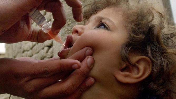 Parents are urged to vaccinate their children despite the low risk of a polio outbreak in Victoria. (AP PHOTO)