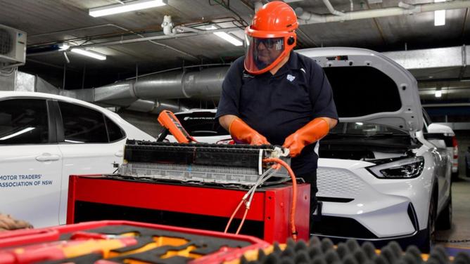 Australia will need to deal with a huge volume of depleted electric car batteries within decades. (Bianca De Marchi/AAP PHOTOS)