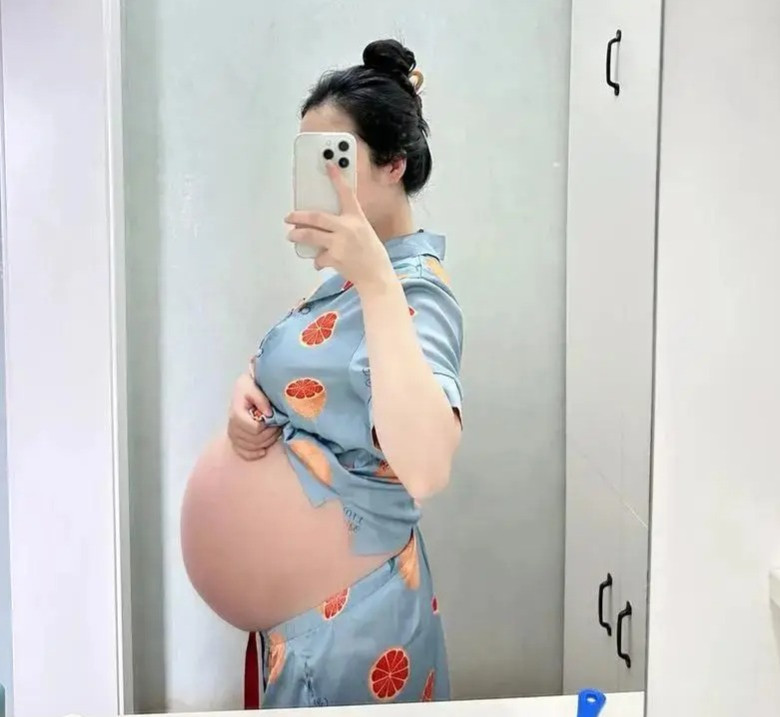 Người vợ mang thai đôi Long - Phụng, được chồng cưng chiều hết mực.