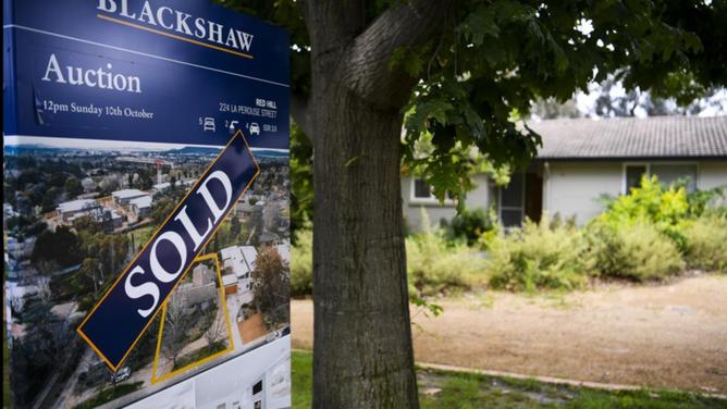 Another interest rate hike is expected when the RBA meets, placing further pressure on homeowners. (Lukas Coch/AAP PHOTOS)