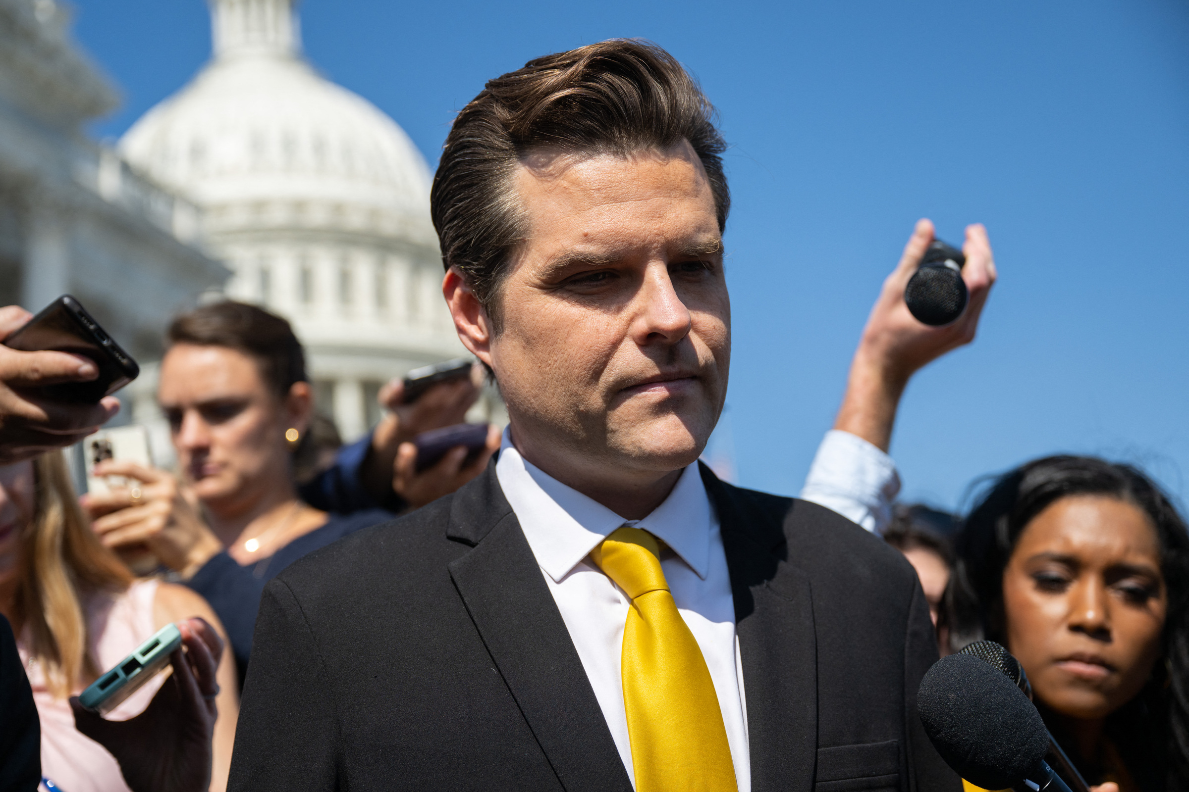 Hạ nghị sĩ Cộng hòa Matt Gaetz trả lời truyền thông bên ngoài tòa nhà quốc hội Mỹ ở Washington ngày 2/10. Ảnh: AFP