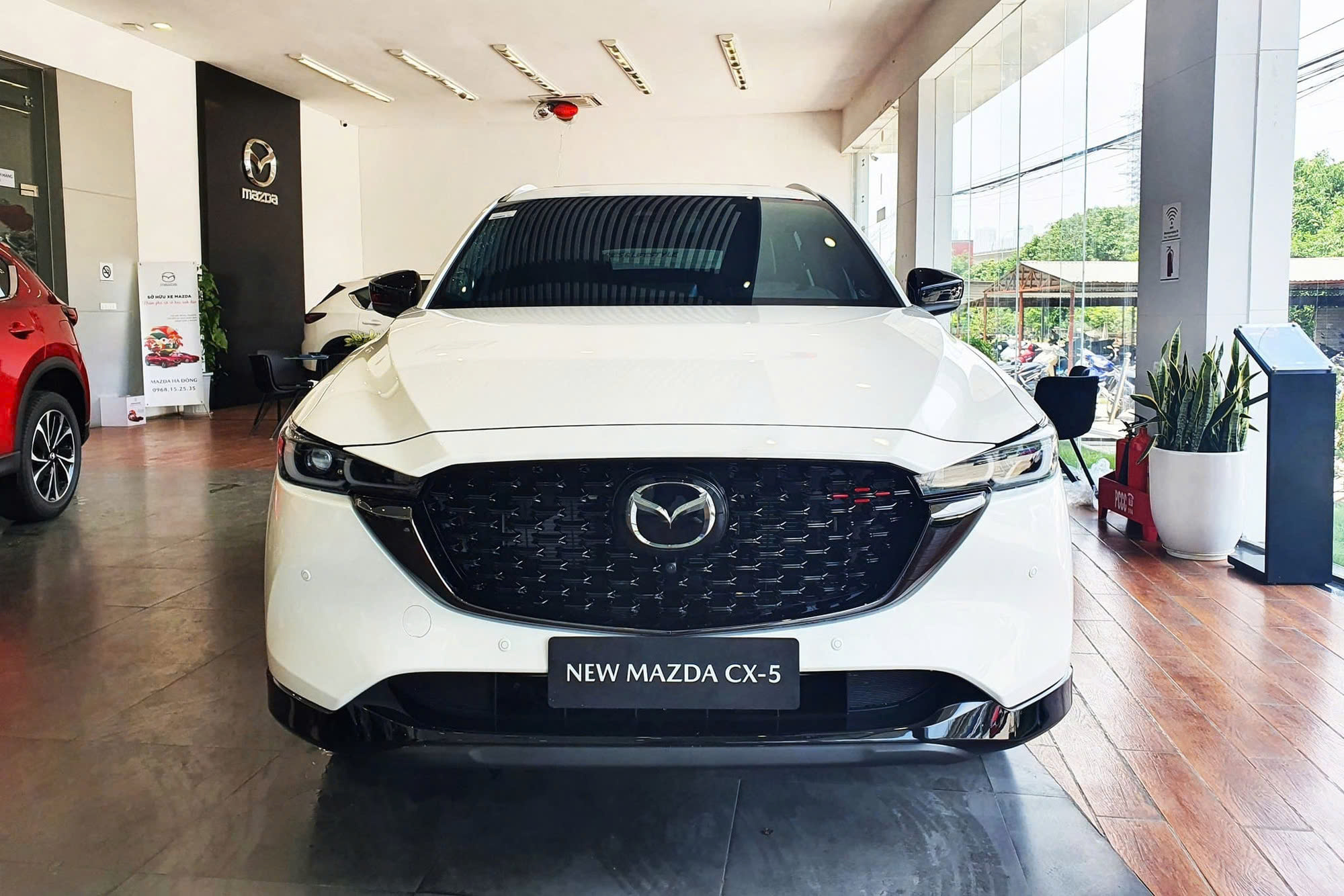 Cùng giá 979 triệu đồng, chọn Tucson 1.6 Turbo hay CX-5 2.5 Signature Exclusive và đây là bảng so sánh chi tiết- Ảnh 4.