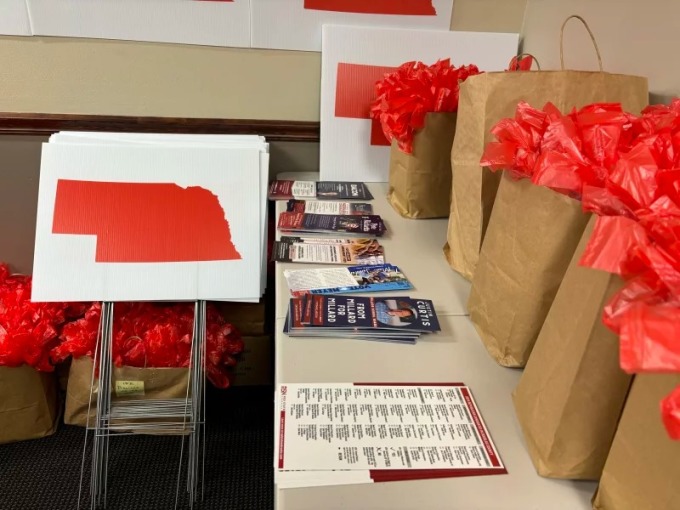 A group called Red State Nebraska made their own signs to counter the blue dot signs.