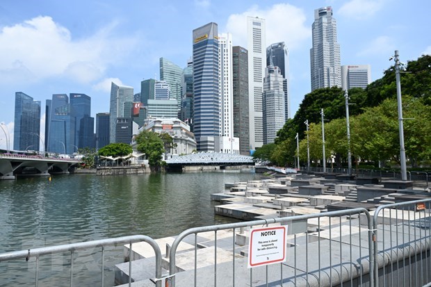 Singapore se cho cong chuc nghi khong luong neu khong tiem phong hinh anh 1