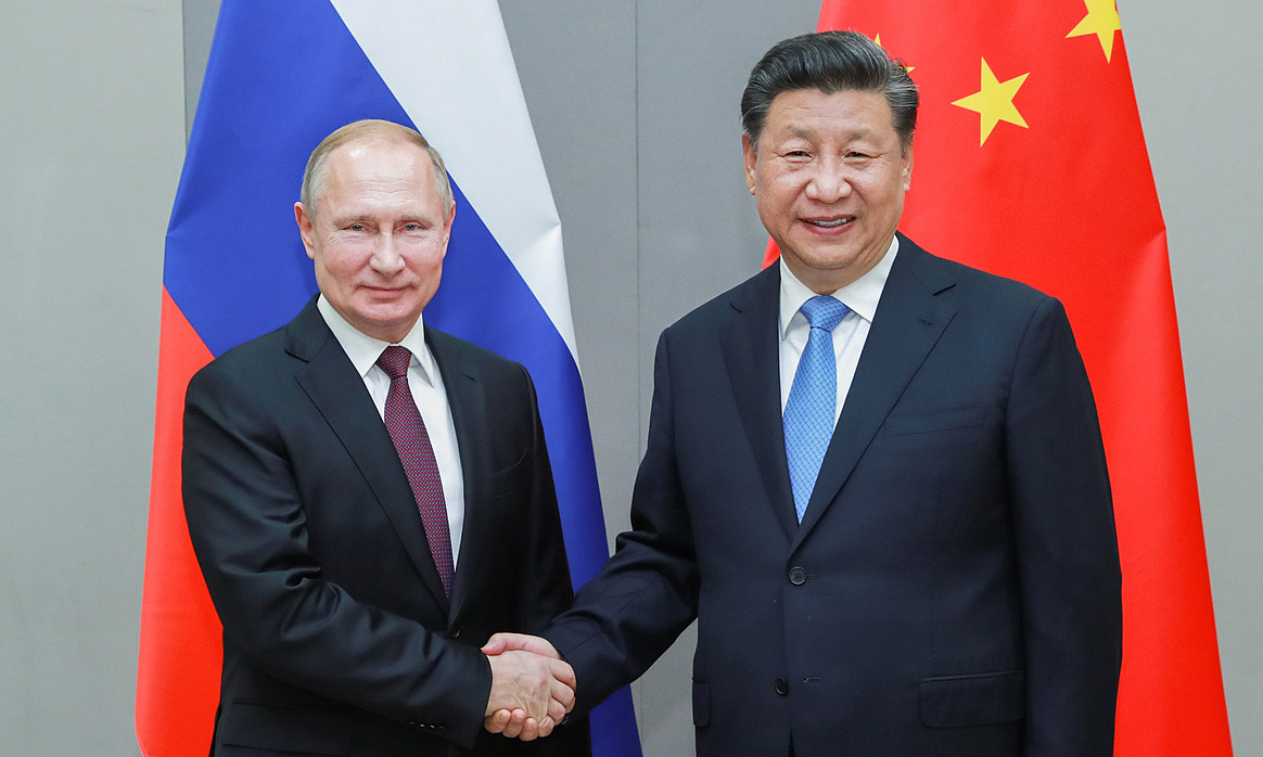 Tổng thống Nga Putin (trái) và Chủ tịch Trung Quốc Tập Cận Bình tại Brazil hồi đầu năm 2019. Ảnh: Xinhua.