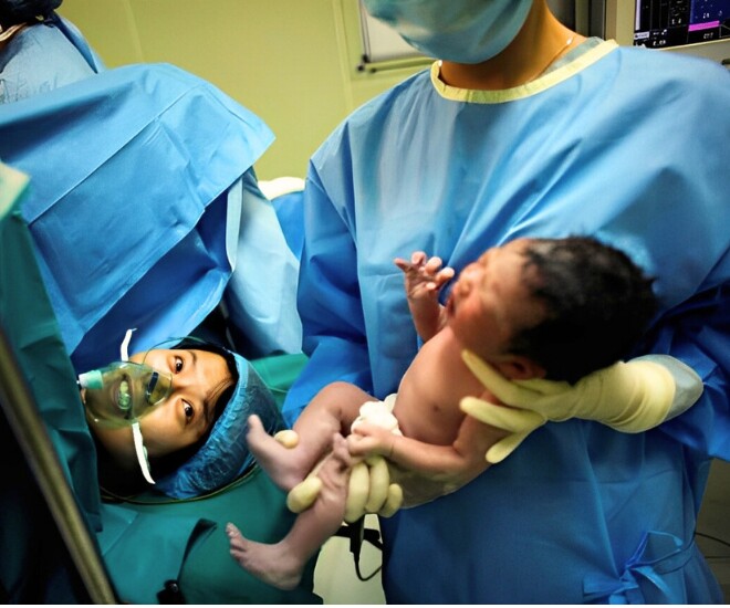 Sản phụ 36 tuổi một mình vượt cạn vì chồng chưa về kịp - Ảnh minh hoạ.