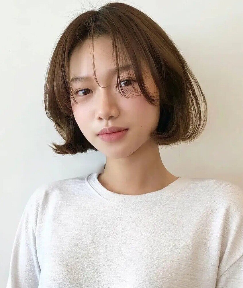 5 kiểu tóc uốn đuôi cụp bỗng được chị em yêu thích, cắt xong mặt thon gọn, trẻ hơn thấy rõ - 1