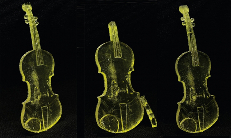 Các vật dụng in 3D bổ sung trithiocarbonate, ví dụ chiếc đàn violin này, có thể tự vá lành khi đặt dưới ánh đèn LED cực tím. Ảnh: UNSW
