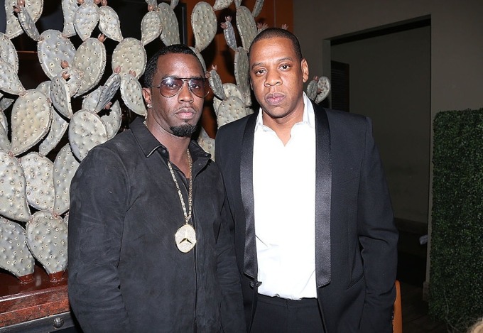 Diddy (trái) và Jay-Z tại sự kiện The Two Kings Dinner ở Texas năm 2013. Ảnh: WireImage