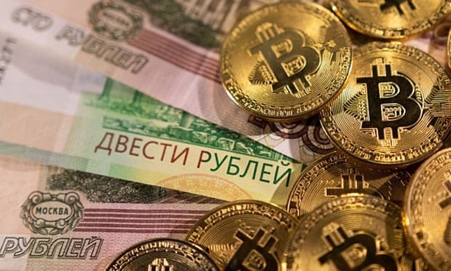 Nga đang tích cực dùng nội tệ và Bitcoin trong thanh toán quốc tế. Ảnh: Reuters